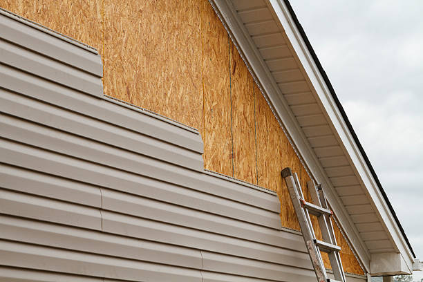 Professional Siding Installation technician working in Pine Meadow, CT
